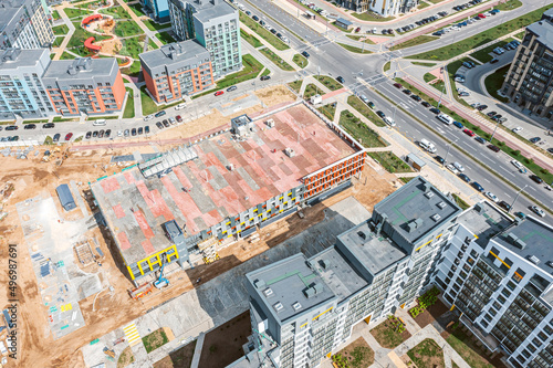 aerial view of construction site of multilevel carpark in residential area