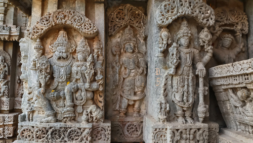 Sculpture of Lord Sri Lakshimi Narasimha Swamy and Lord Vishnu on the wall of Lakshminarsimha Temple, Javagal, Hassan, Karnataka, India photo