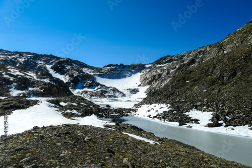Panoramic view on the mountains of High Tauern Alps in Carinthia and Salzburg, Austria, Europe. Glacier lakes of the Goldbergkees in the Hohe Tauern National Park. Patagonia like landscape. Snow