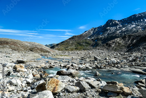 Panoramic view on a glacier lake on the feet of Hoher Sonnblick in the mountains of High Tauern Alps in Carinthia, Salzburg, Austria, Europe. Goldbergkees in Hohe Tauern National Park. Like Patagonia © Chris