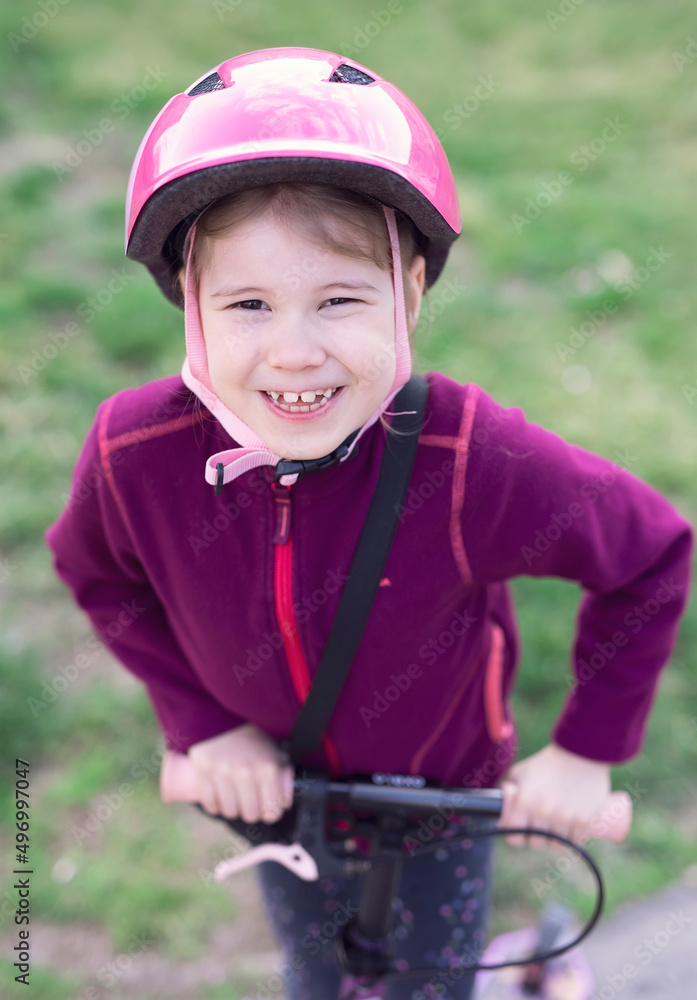 Young beauty girl child with scooter bike outdoor Young beauty girl child with scooter bike outdoor