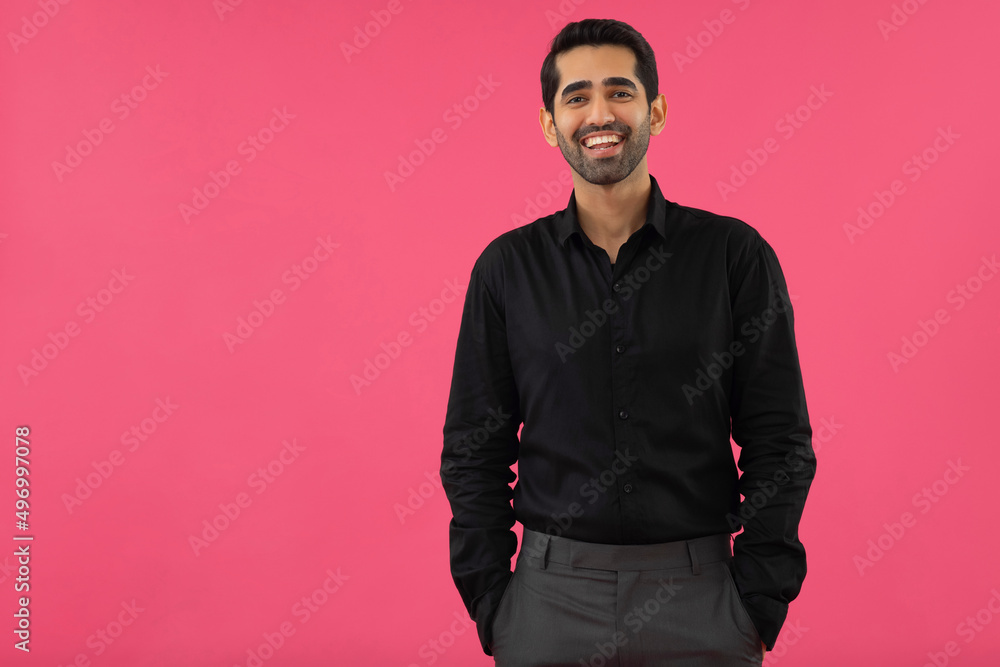 Portrait of happy corporate man standing with hands in pockets Portrait of happy corporate man standing with hands in pockets