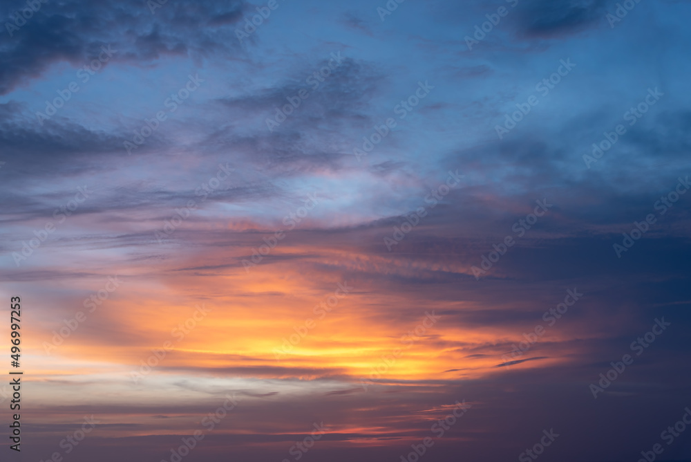 Dramatic twilight landscape of sunset or sunrise sky with colorful cloud.