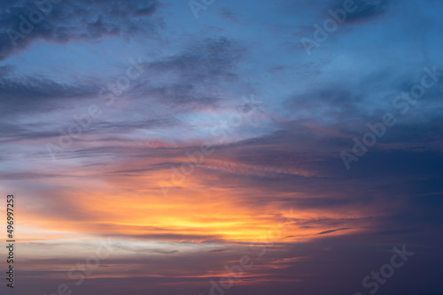 Dramatic twilight landscape of sunset or sunrise sky with colorful cloud. © torjrtrx