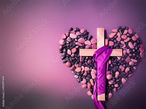 Lent Season,Holy Week and Good Friday concepts - photo of religious cross in purple vintage background. Stock photo.