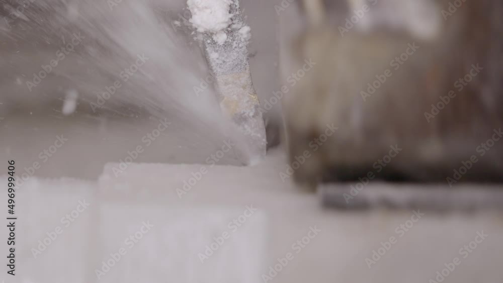 Machine grinding piece of Makrana marble. Close up, gimbal Machine grinding piece of Makrana marble. Close up, gimbal