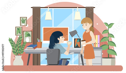 Two women working on computer