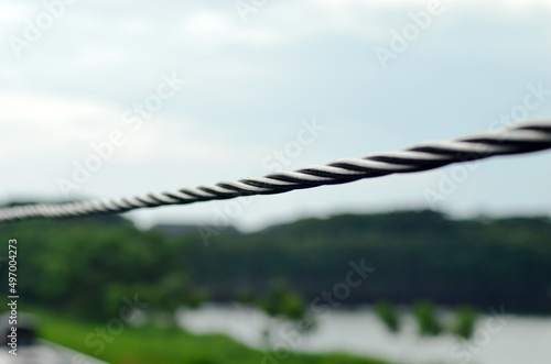 Photo of Hanging Steel Wire Cable Rope with blur background