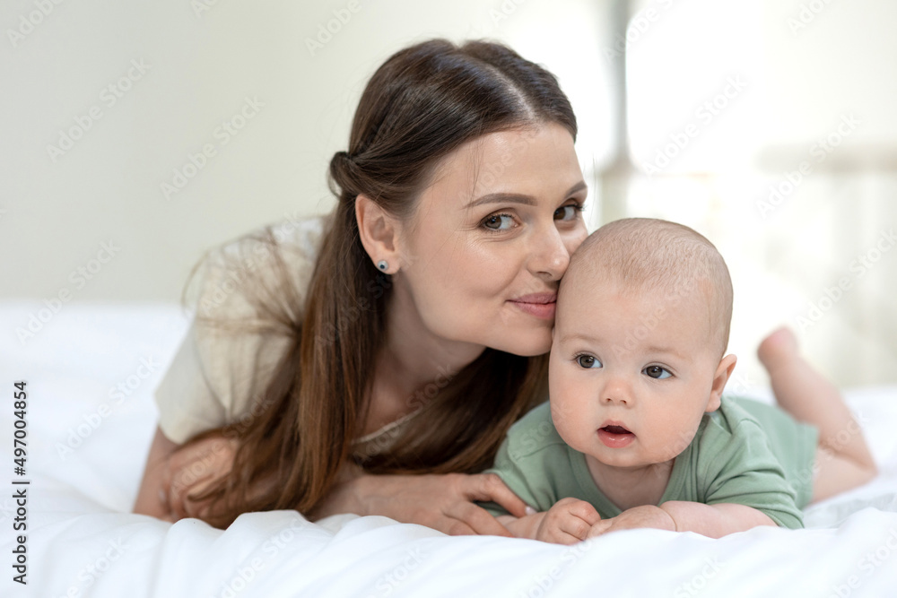 A woman with a small child. Mom with a baby. High quality photo A woman with a small child. Mom with a baby. High quality photo