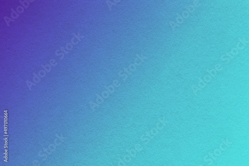 Texture of old navy blue and turquoise paper background, with gradient, macro. Structure of cerulean craft cardboard