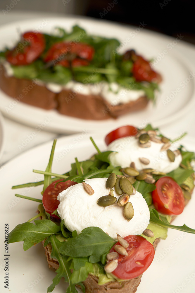 Bruschetta with Tomato, cheese and herbs Bruschetta with Tomato, cheese and herbs
