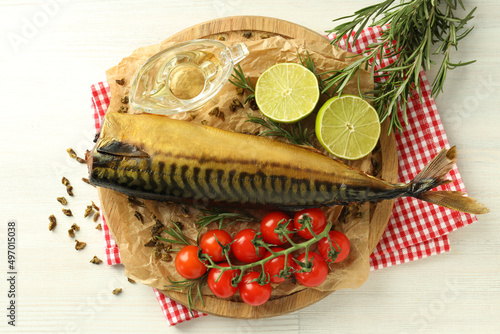 Concept of tasty food with smoked mackerel, top view