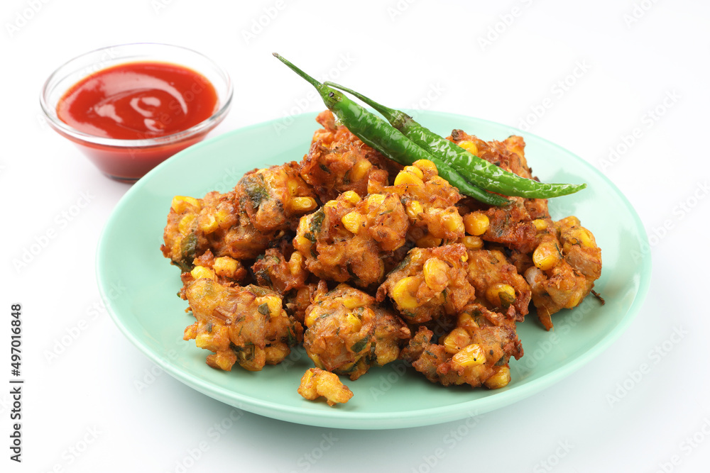 Crispy Corn pakora/pakoda, bhajji, Bhaji, bajji or pattice . served with tomato ketchup & mint chutney Crispy Corn pakora/pakoda, bhajji, Bhaji, bajji or pattice . served with tomato ketchup & mint chutney