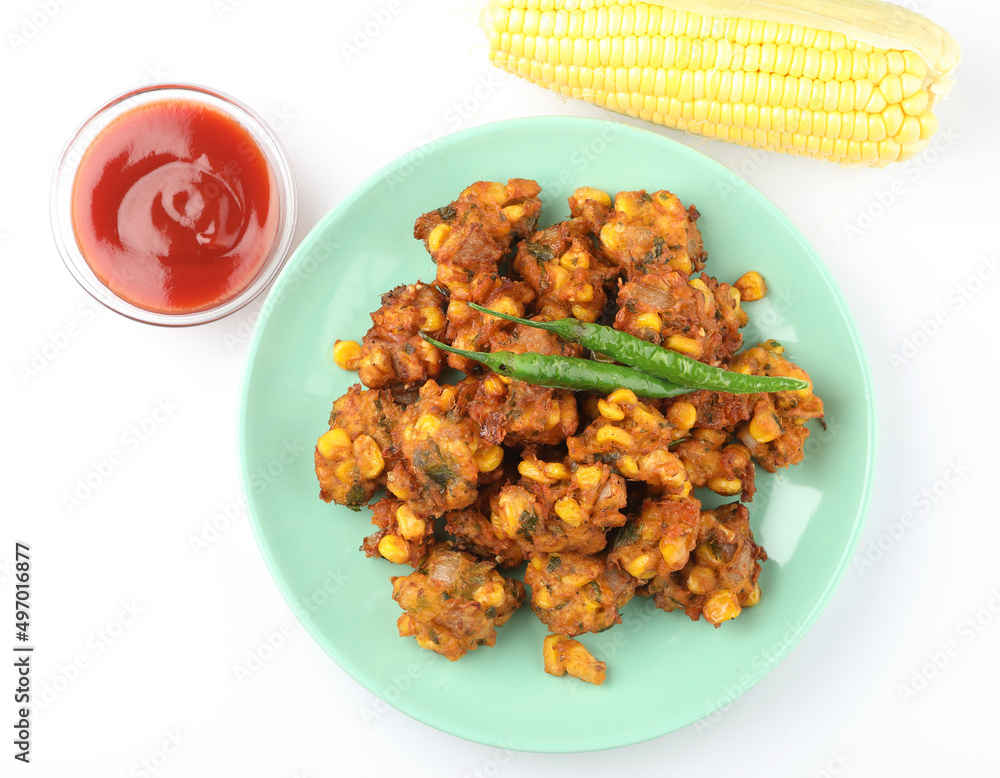 Crispy Corn pakora/pakoda, bhajji, Bhaji, bajji or pattice . served with tomato ketchup & mint chutney Crispy Corn pakora/pakoda, bhajji, Bhaji, bajji or pattice . served with tomato ketchup & mint chutney