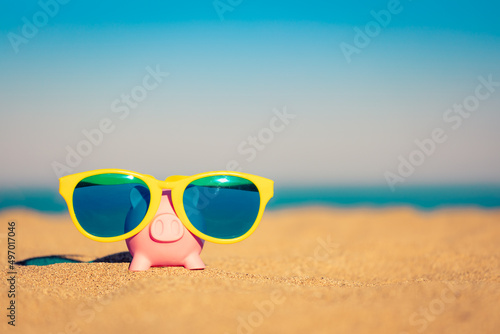 Fototapeta Naklejka Na Ścianę i Meble -  Piggybank on the beach in summer
