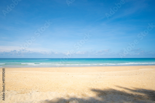 Fototapeta Naklejka Na Ścianę i Meble -  Phuket beach sea sand and sky. Landscape view of beach sea in summer day. Beach space area. At Karon Beach, Phuket, Thailand. On 15 Jan 2022. 4K UHD. Video Clip Nature and travel concept.