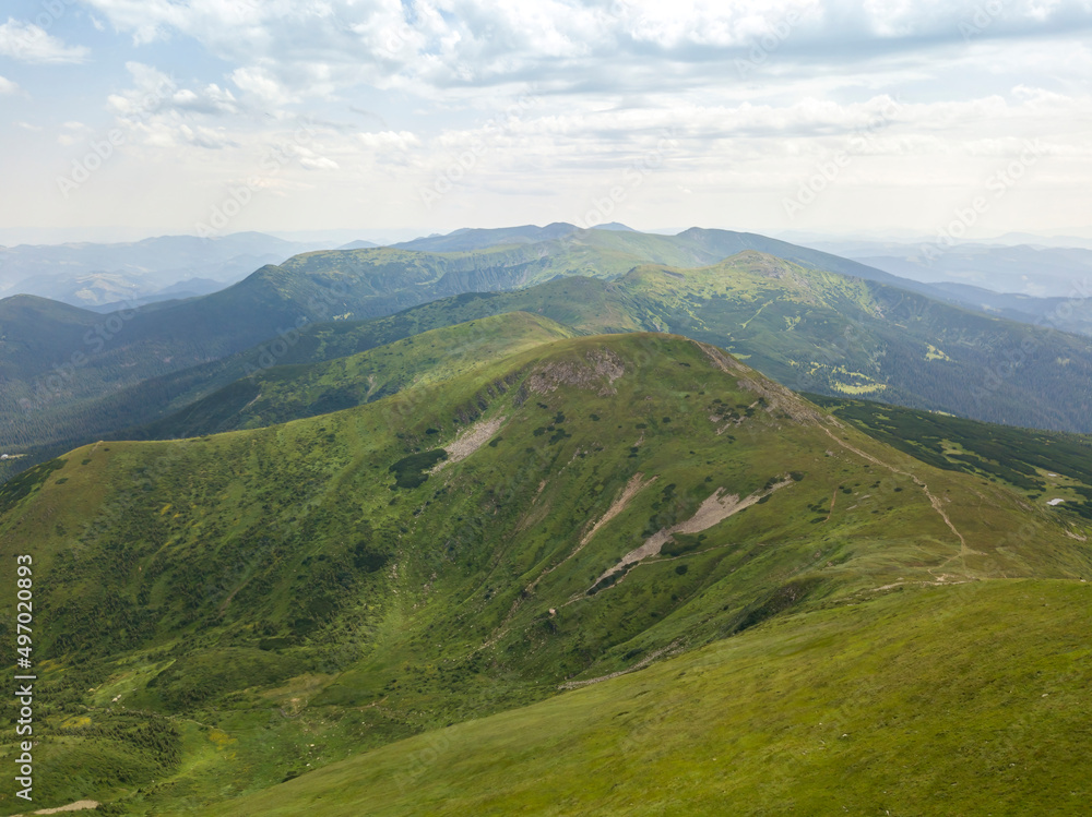 High mountains of the Ukrainian Carpathians in cloudy weather. Aerial drone view. High mountains of the Ukrainian Carpathians in cloudy weather. Aerial drone view.