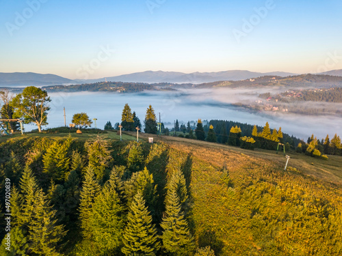 Fog in the Ukrainian Carpathians in the morning. Aerial drone view.