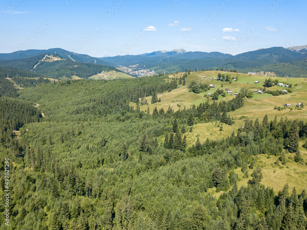 Green mountains of Ukrainian Carpathians in summer. Sunny clear day. Aerial drone view. Green mountains of Ukrainian Carpathians in summer. Sunny clear day. Aerial drone view.