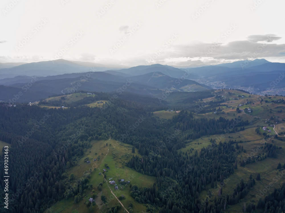 Obraz premium Sunset over the mountains in the Ukrainian Carpathians. Evening. Aerial drone view.