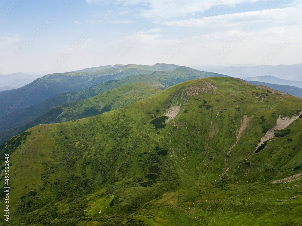Obraz premium High mountains of the Ukrainian Carpathians in cloudy weather. Aerial drone view.