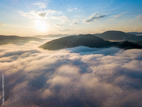 Morning fog in the Ukrainian Carpathians. Aerial drone view.