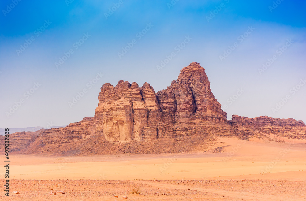 Sands and mountains of Wadi Rum desert in Jordan, beautiful daytime landscape Sands and mountains of Wadi Rum desert in Jordan, beautiful daytime landscape