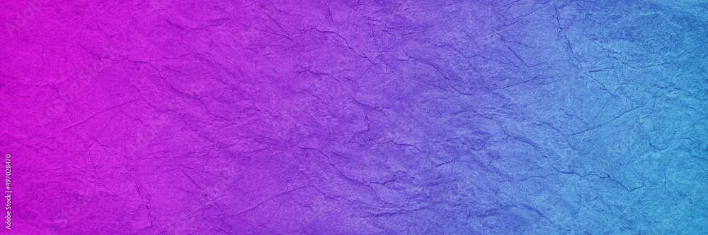Beautiful abstract colorful texture. Multicolor green blue purple pink background. Gradient. Toned rough rock surface texture. Backdrop. Modern. Сopy space. For design. Web banner. Wide. Panoramic.