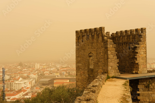 Saharan dust know as Clay Rain, blankets the town of Castleo Branco in Portugal photo