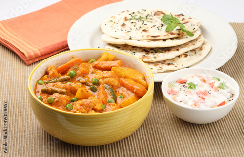 Indian food Mix vegetable curry with Tandoori roti or nan, Indian flat bread