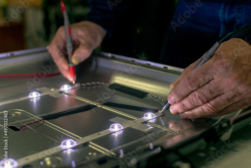 led lights of a TV screen.