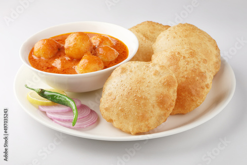 Indian food - Puri Bhaji. North India. Puri is a deep fried bread made from whole wheat flour & Served with Potato curry , bhaji or alu ki sabji.or Potato curry or dum alu curry
