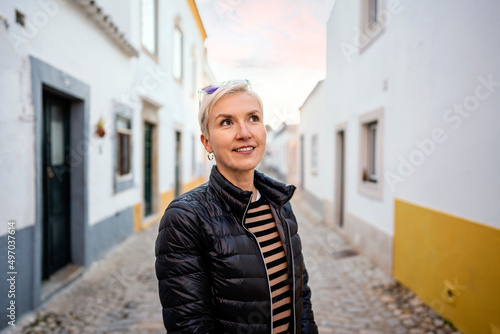 Portrait of blond modern woman in urban settings