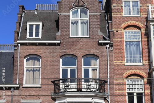 Amsterdam Paulus Potterstraat Street Brick House Facade with Balcony Close Up, Netherlands photo