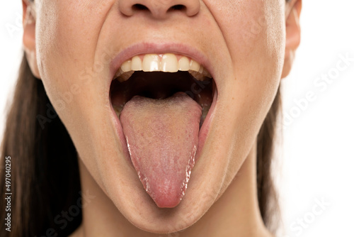 Close up of a front view of a woman tongue