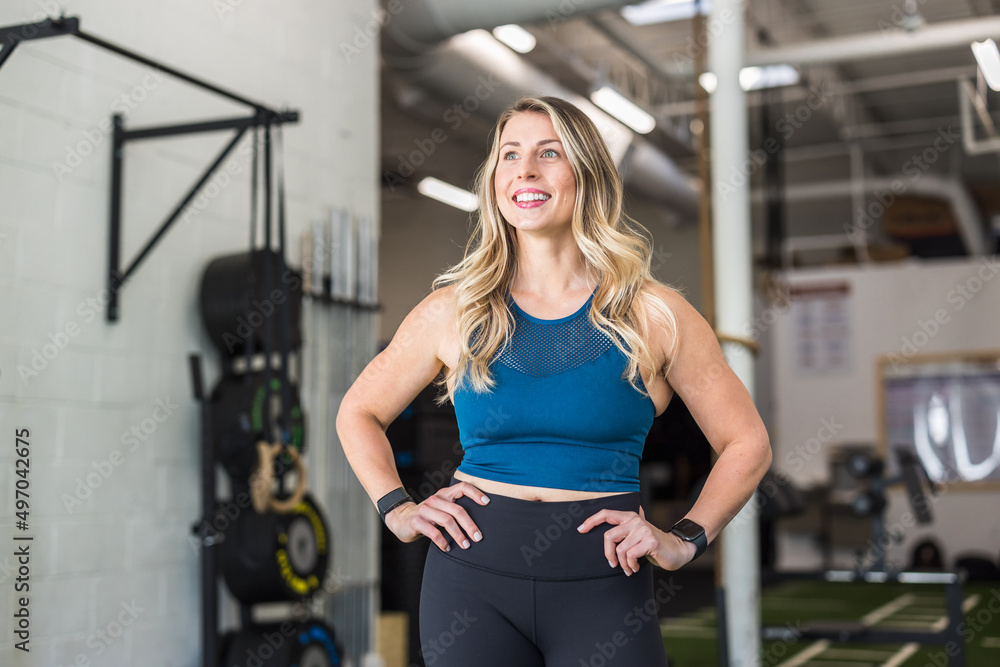 body builder woman . woman in a gym. fitness woman standing in gym with smiley face, body builder woman . woman in a gym. fitness woman standing in gym with smiley face,