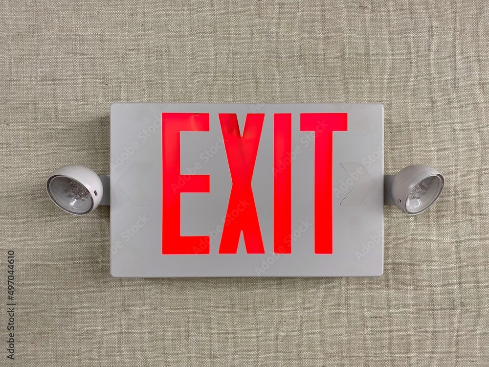 Exit emergency sign. Fire exit. Rescue red led light. Modern fire