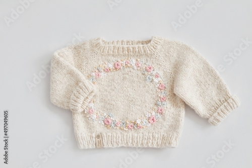 Knitted sweater and jumper, kids clothes and accessories for knitting. Needlework and knitting. Hobbies and creativity. Knit for children. Handmade. Hobbies and creativity