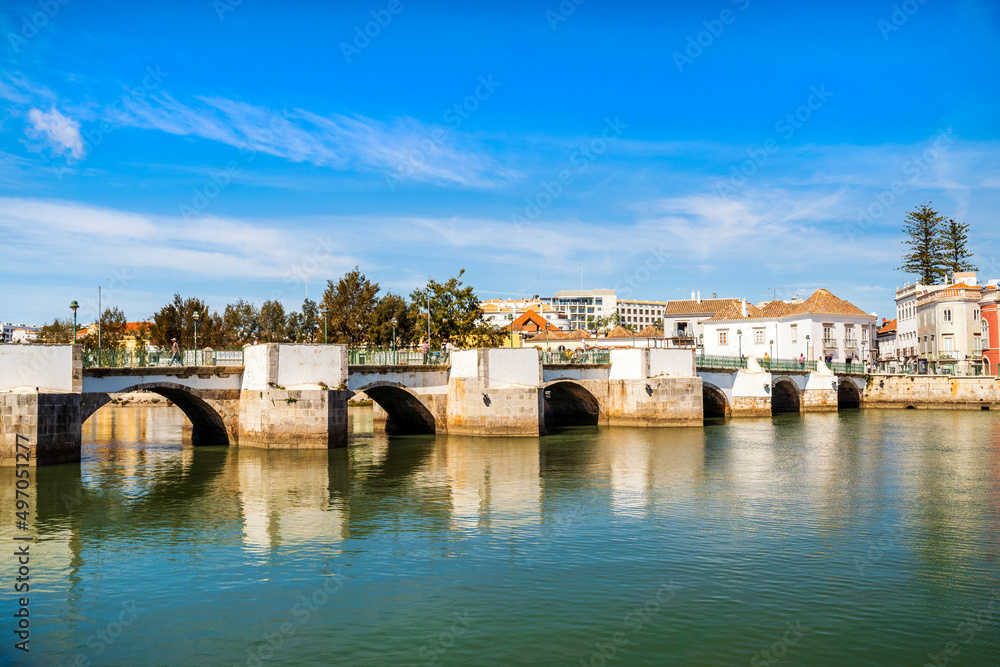 Naklejka premium Beautiful cityscape of historic Tavira by Gilao river, Algarve, Portugal