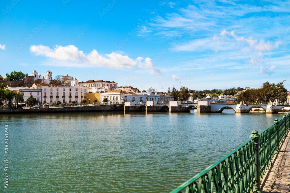 Beautiful cityscape of historic Tavira by Gilao river, Algarve, Portugal Beautiful cityscape of historic Tavira by Gilao river, Algarve, Portugal