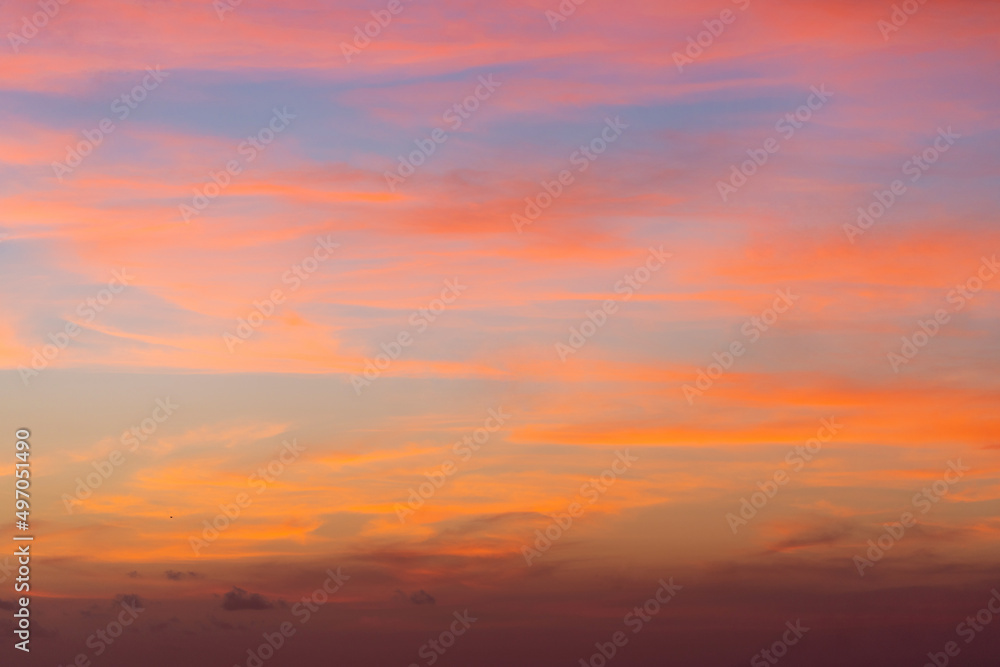 Fototapeta premium Orange sunset sky with clouds. Beautiful landscape, sunrise