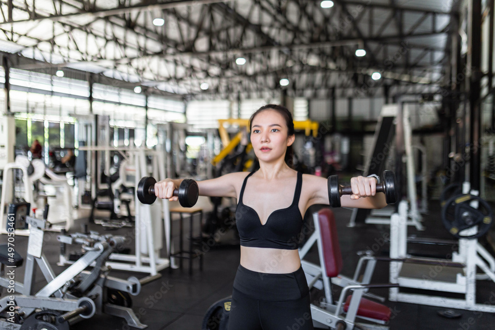 exercise concept The exercising starter giving a focus on working on dumbbells by doing core stabilization with both arms exercise concept The exercising starter giving a focus on working on dumbbells by doing core stabilization with both arms