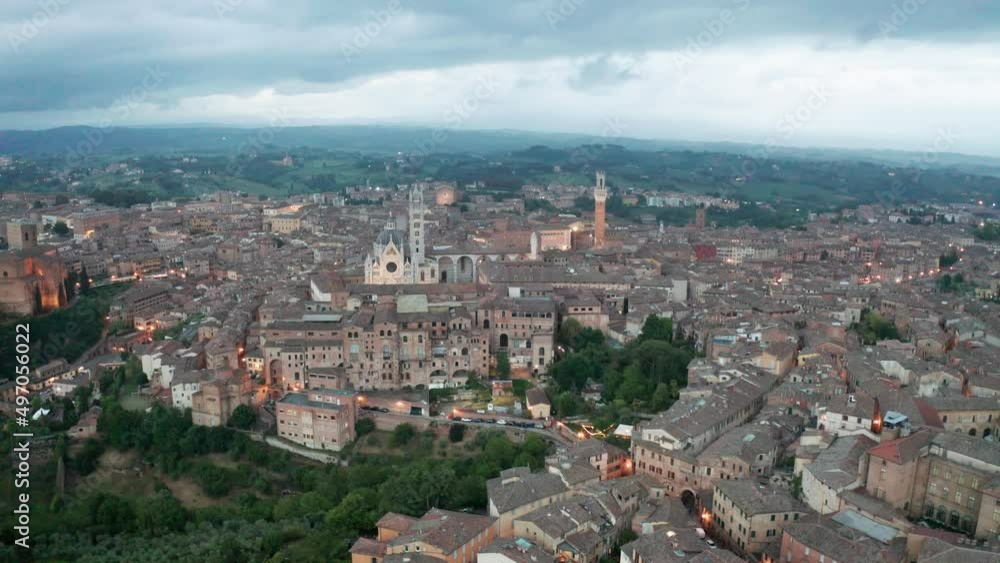 aerial view of Siena after sunset. rising movement aerial view of Siena after sunset. rising movement