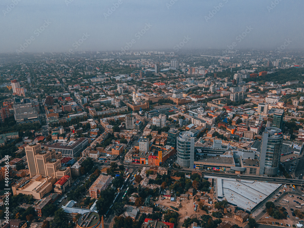 Naklejka premium Dnipro, Ukraine. View of the central part of the city, the embankment of the Dnieper River. Top view from a great height. Panoramic view of the city.