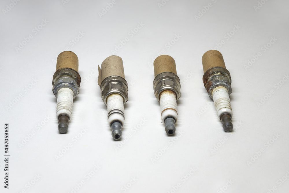 spark plug set, worn, corrosion, used, in cardboard packaging for thread spark plug set, worn, corrosion, used, in cardboard packaging for thread