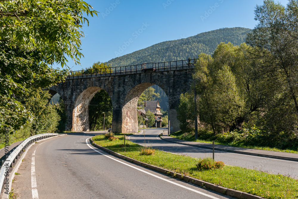 Fototapeta premium A big, old, ancient aqueduct bridge in the mountains