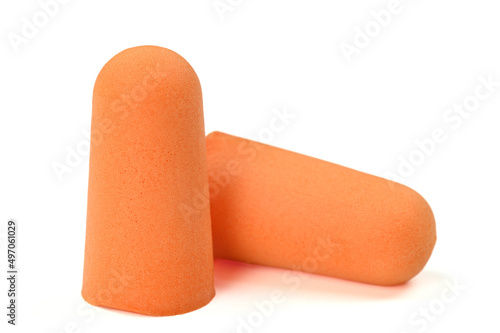 Foto Orange earplugs highlighted on a white background