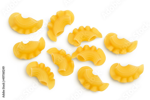 Pasta cornetti creste macaroni isolated on white background with clipping path and full depth of field. Top view. Flat lay