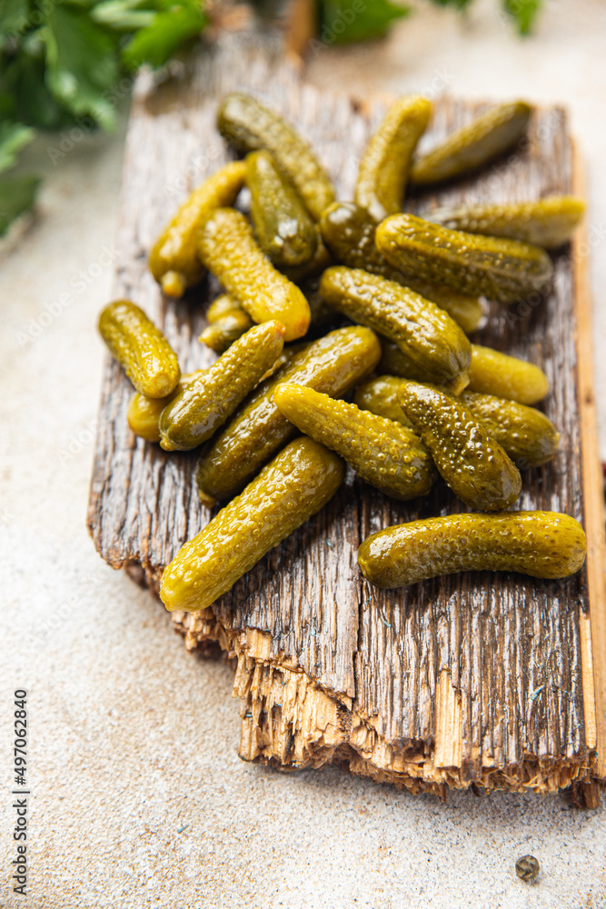 gherkins cucumbers salted pickled vegetable food meal food diet snack on the table copy space food background gherkins cucumbers salted pickled vegetable food meal food diet snack on the table copy space food background