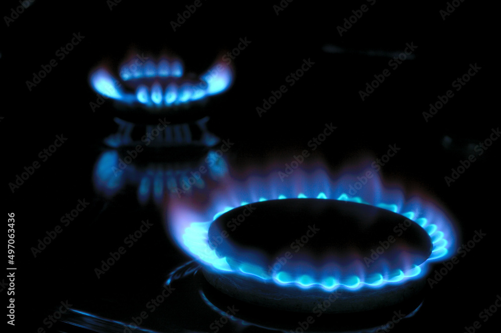 gas burner with burning gas. dark background gas burner with burning gas. dark background